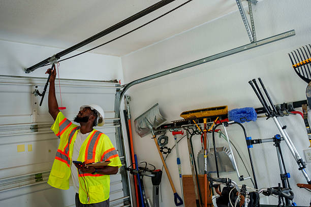 Professional Garage Door Panel Replacement technician working in Jamesport, NY